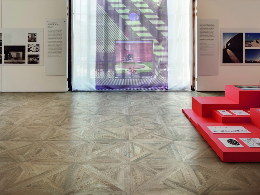 Porcelain tiles that look like assembled parquet panels ...